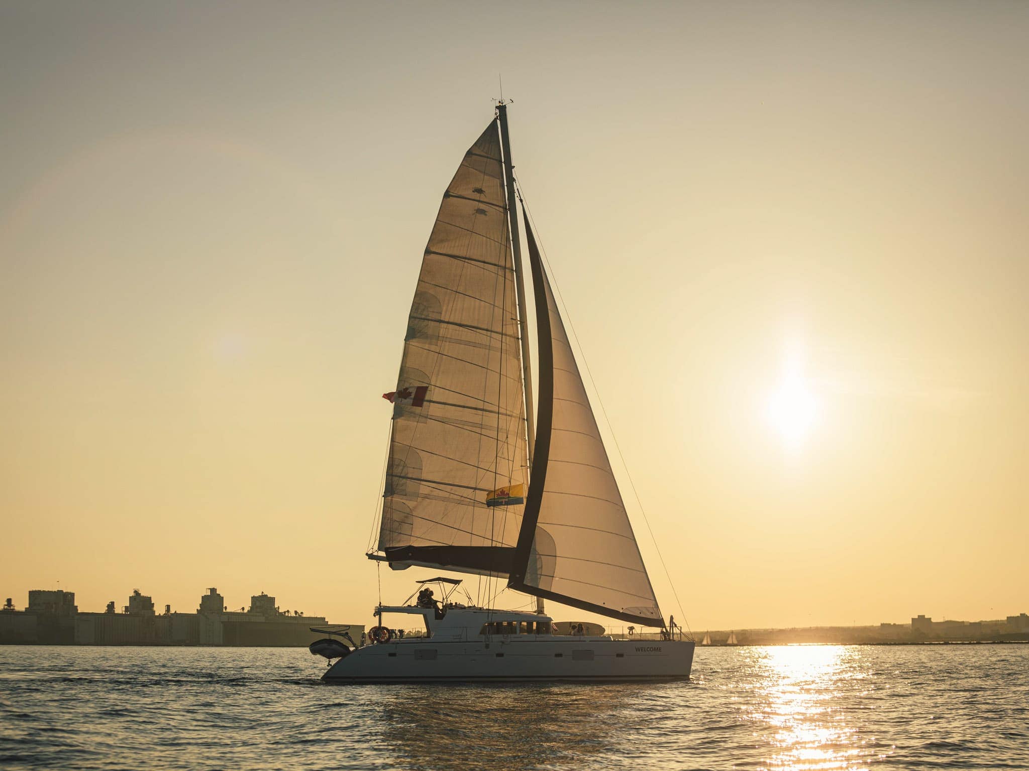 Catamaran at sunset around Thunder Bay Harbour