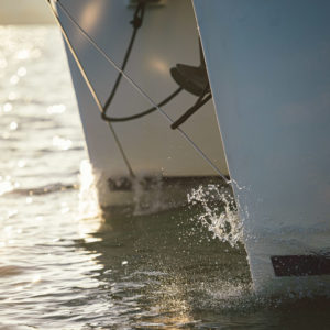 side shot of anchor and bow of catamaran