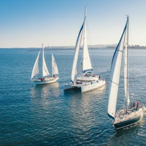 fleet with sun behind