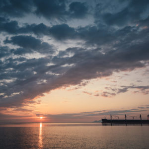 Ship on the water at sunrise, Lake Superior at Thunder Bay