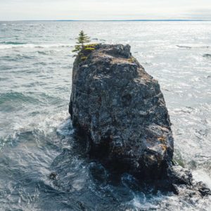 freestanding rock in the lake