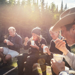meal around the campfire