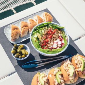 salad and sandwiches on deck