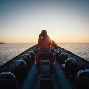 full boat rear zodiac at sunrise